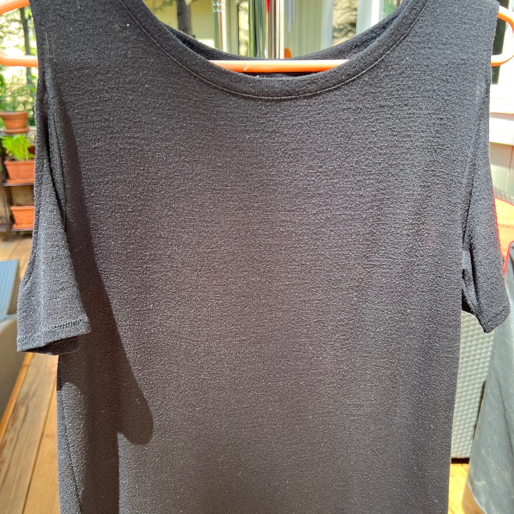 Rag and Bone black short sleeve sweater/blouse with shoulder cut outs.